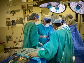 FILE PHOTO: Dr. Martin Gleave preforms prostate surgery on a patient at the Vancouver General Hospital in Vancouver, British Columbia on March 23, 2018.