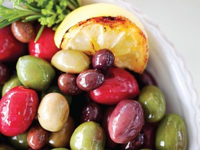 Variety is the key to Warmed Olives with Grilled Lemons. Our recipe includes Nicoise, Kalamata, Bella diCerignola and Picholine olives, but feel free to substitute your favourites.