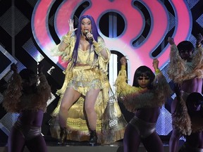 US rapper Cardi B performs onstage during the KIIS FM's iHeartRadio Jingle Ball 2018 at the Forum Los Angeles in Inglewood on November 30, 2018. - The tour makes stops in Dallas, L.A., San Francisco, Minneapolis, Boston, Philadelphia, New York, Washington, D.C., Chicago, Atlanta, Tampa, and Miami/Ft. Lauderdale. The annual holiday concert will be televised as a special on The CW Network on December 16 at 8 p.m. EST/PST.