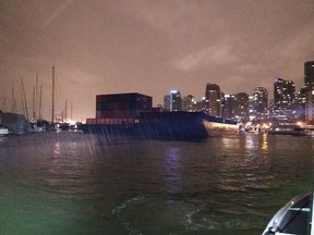 VPD Marine Unit responded to 2 runaway barges that had already damaged the seaplane base, two luxury yachts and a restaurant. Our vessel pushed the barges until emergency tugs arrived preventing further damage and incursion into Coal Harbour, Vancouver Police Marine Unit tweeted with this photo.