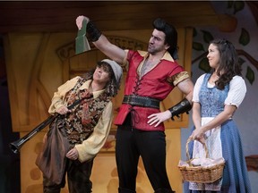 Ali Watson, Kamyar Pazandeh, and Michelle Bardach in the Arts Club's Disney's Beauty and the Beast. Set design by Alison Green, costume design by Barbara Clayden, lighting design by Gerald King, and projection design by Joel Grinke.
