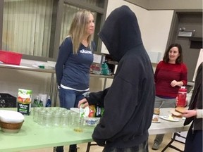 Breakfast at Dover Bay Secondary is on its last legs. Child, youth and family worker Janyce McKee supervises breakfast. To the right is teacher Devon Jones.