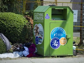 Woman dies after getting trapped in Toronto clothing donation bin: police. A clothing donation bin at Renfrew and Grandview, Vancouver, July 24 2018.