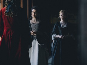 Rachel Weisz and Emma Stone, right, in a scene from the film, The Favourite.