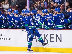 Josh Leivo celebrates his first-period goal Tuesday in debut with Canucks.