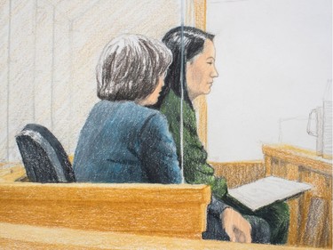 In this courtroom sketch, Meng Wanzhou, back right, the chief financial officer of Huawei Technologies, sits beside a translator during a bail hearing at B.C. Supreme Court in Vancouver, on Dec. 7, 2018. She was arrested Saturday after an extradition request from the United States while in transit at the city's airport.