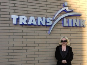 Laura Mackenrot, the former vice-chair of the City of Vancouver's persons with disabilities advisory committee, outside TransLink headquarters. The board approved a policy that will see washrooms added to stations along the transit system.