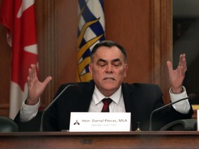 House Speaker Darryl Plecas answers questions from the opposition during a Legislative Assembly Management Committee meeting in the Douglas Fir room at Legislature in Victoria, B.C., on Thursday, December 6, 2018.