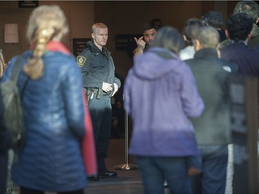 Huawei executive Meng Wanzhou appeared in BC Supreme Court in Vancouver, Dec. 7, 2018 for a bail hearing. Pictured are sheriffs keeping a close eye on people who came to watch the proceedings.