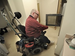 Sean Haffey, a stroke survivor, is in an accessible suite designed for people in wheelchairs thanks to The Right Fit. Photo: Nick Procaylo/PostMedia
