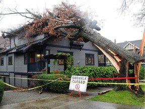 Power has now been restored to all customers in the Lower Mainland and Fraser Valley affected by last week's storm. This home at West 15th and Yukon in Vancouver was one of several damaged in the storm last week.