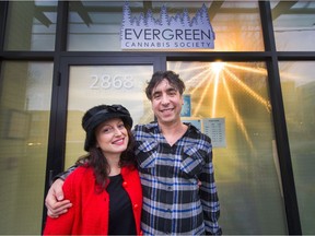 Mike Babins and Maria Petrucci outside Evergreen Cannabis Society on West 4th ave in Vancouver, BC, Dec. 26, 2018.