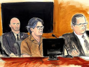 In this courtroom sketch Keith Raniere, second from right, leader of the secretive group NXIVM, attends a court hearing Friday, April 13, 2018, in the Brooklyn borough of New York.