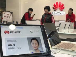 A profile of Huawei's chief financial officer Meng Wanzhou is displayed on a Huawei computer at a Huawei store in Beijing, China, Thursday, Dec. 6, 2018.