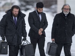 Jaskirat Singh Sidhu, the driver of a transport truck involved in the deadly crash with the Humboldt Bronco's bus, and his lawyer Mark Brayford, left Glen Luther enter the Kerry Vickar Centre, which is being used for Sidhu's sentencing hearing, in Melfort, SK on Thursday, January 31, 2019.