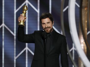 In this handout photo provided by NBCUniversal, Christian Bale from Vice accepts the Best Actor in a Motion Picture Musical or Comedy award onstage during the 76th Annual Golden Globe Awards at The Beverly Hilton Hotel on January 06, 2019 in Beverly Hills, California. (Photo by Paul Drinkwater/NBCUniversal via Getty Images)