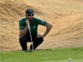 Adam Hadwin of Canada lines up a putt on the 1st hole during the final round of the Desert Classic at the Stadium Course on January 20, 2019 in La Quinta, California.