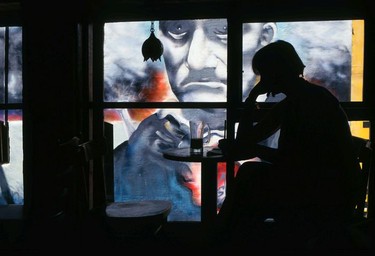 Metering background light to create a silhouette, San Francisco cafe, U.S.