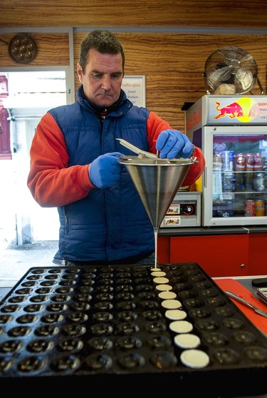 Making Poffertjes (sugary mini pancakes) - Albert Cuyp Markt.