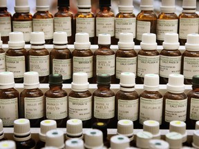 Homeopathic remedies are seen on display.
