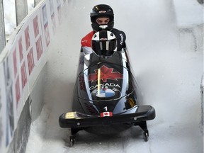 Canada's Justin Kripps and Cameron Stones arrive to the finish area at the end of the second run of the two-man Bobsled World Cup race in Igls, near Innsbruck, Austria, Saturday, Jan. 19, 2019.