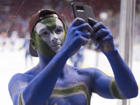 Brock Boeser of the Vancouver Canucks, right, hopes to find his scoring touch on the team's sluggish power play, especially with teammate Elias Pettersson out of the lineup.