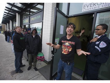 Vancouver, BC's first licensed pot shop, Evergreen Cannabis Society on W. 4th Avenue, officially opens its doors to paying customer Saturday, January 5, 2019. Pictured is co-owner Mike Babins opening the doors.