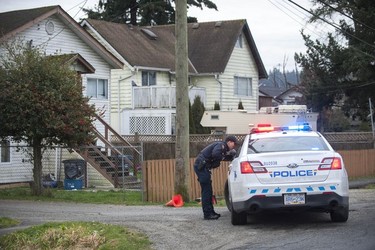 RCMP search the Bridgeview neighbourhood in Surrey on Jan. 31, 2019. They are looking for the person who shot and wounded a Transit Police officer Wednesday afternoon at the Scott Road Skytrain station.