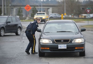 RCMP search the Bridgeview neighbourhood in Surrey on Jan. 31, 2019. They are looking for the person who shot and wounded a Transit Police officer Wednesday afternoon at the Scott Road Skytrain station.