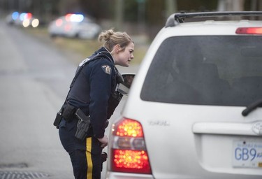 RCMP search the Bridgeview neighbourhood in Surrey on Jan. 31, 2019. They are looking for the person who shot and wounded a Transit Police officer Wednesday afternoon at the Scott Road Skytrain station.