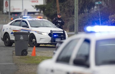 RCMP search the Bridgeview neighbourhood in Surrey on Jan. 31, 2019. They are looking for the person who shot and wounded a Transit Police officer Wednesday afternoon at the Scott Road Skytrain station.