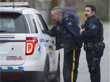 RCMP search the Bridgeview neighbourhood in Surrey on Jan. 31, 2019. They are looking for the person who shot and wounded a Transit Police officer Wednesday afternoon at the Scott Road Skytrain station.