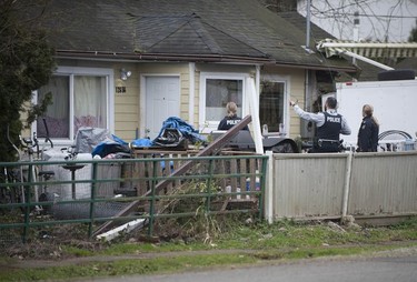 RCMP search the Bridgeview neighbourhood in Surrey on Jan. 31, 2019. They are looking for the person who shot and wounded a Transit Police officer Wednesday afternoon at the Scott Road Skytrain station.