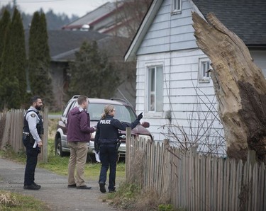 RCMP search the Bridgeview neighbourhood in Surrey on Jan. 31, 2019. They are looking for the person who shot and wounded a Transit Police officer Wednesday afternoon at the Scott Road Skytrain station.