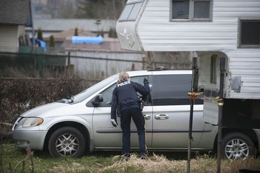 RCMP search the Bridgeview neighbourhood in Surrey on Jan. 31, 2019. They are looking for the person who shot and wounded a Transit Police officer Wednesday afternoon at the Scott Road Skytrain station.