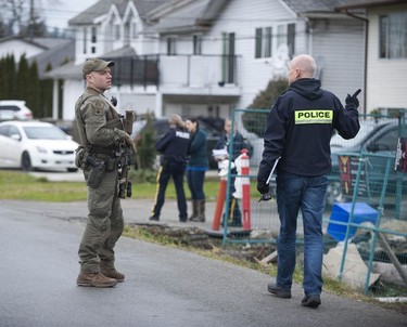 RCMP search the Bridgeview neighbourhood in Surrey on Jan. 31, 2019. They are looking for the person who shot and wounded a Transit Police officer Wednesday afternoon at the Scott Road Skytrain station.