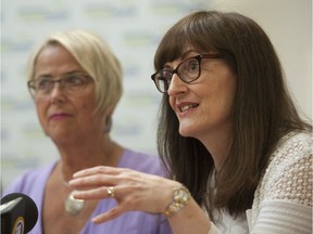 Judy Darcy, B.C.'s minister of mental health and addictions (left), with Dr. Patricia Daly, the chief medical health officer at Vancouver Coastal Health, at the Lookout Housing and Health Society facility on Powell Street in Vancouver.