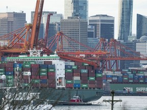 A crane has fallen on to container ship at Port of Vancouver.
