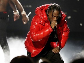 FILE - In this Sept. 17, 2016, file photo, Travis Scott perform during the BET Hip Hop Awards in Atlanta. Big Boi and Scott will join Maroon 5 in this year's Super Bowl halftime show. Maroon 5 had been the widely reported halftime show act since September, but the NFL officially announced the band as its headliner Sunday, Jan. 13, 2019.