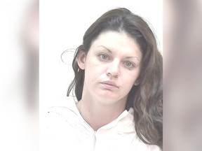 Laetitia Angelique Acera, 25, is shown in this undated police handout photo. She is wanted on charges in Calgary including multiple counts of assault with a weapon, break and enter, fraud under $5,000, motor vehicle and mail theft.