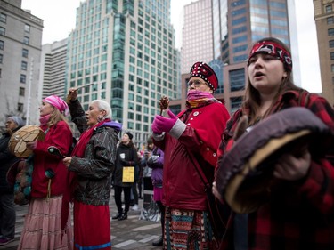 Indigenous women Verna Benson, second right, and Veronica Rose, right, both of the Gitxsan First Nation, attend the third annual Women's March in Vancouver, on Saturday January 19, 2019.
