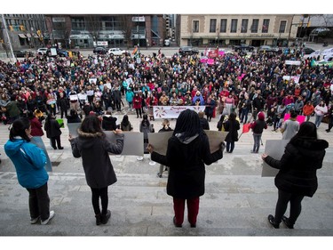 Hundreds of people gather to listen to speeches before participating in the third annual Women's March in Vancouver, on Saturday January 19, 2019.