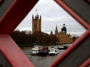 The Houses of Parliament, comprising the House of Lords and the House of Commons,cpictured on the bank of the River Thames in central London on January 2, 2019.