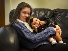 Amber Hawse, 20, with nine-month-old daughter Delilah at Aunt Leah's in New Westminster.