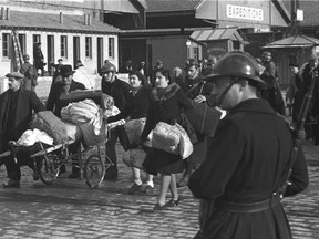 In this 1943 photo, Jews are deported from Marseille under the eye of French police. France, along with other occupied European countries, willingly participated in the deportation of Jewish populations to Nazi death camps.