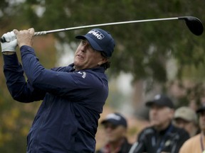 Phil Mickelson watches his tee shot on the fifth hole during the first round of the Desert Classic golf tournament at La Quinta Country Club on Thursday, Jan. 17, 2019, in La Quinta, Calif.