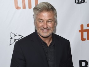 FILE - In this Sept. 9, 2018 file photo, Alec Baldwin attends a gala for "The Public" on day 4 of the Toronto International Film Festival at Roy Thomson Hall, in Toronto. Baldwin is due in court Wednesday, Jan. 23, 2019, in New York City for a hearing on charges that he slugged a man during a dispute over a parking spot last fall. He's charged with misdemeanor attempted assault and harassment, a violation.