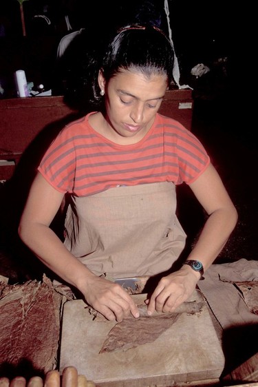 Rolling cigars at the Partagas cigar factory in Havana.