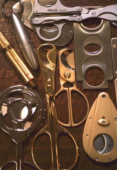 A selection of cigar cutters.