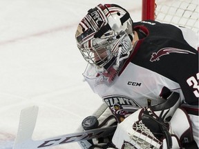 Vancouver Giants goalie Trent Miner stops a Prince Albert Raiders shot in the first period of a regular season WHL hockey game at the Langley Events Centre on Thursday, Jan. 24, 2019.